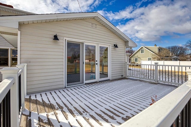 view of snow covered deck