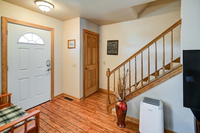 foyer entrance featuring light hardwood / wood-style flooring