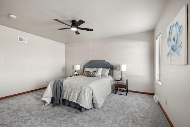 bedroom with ceiling fan and carpet