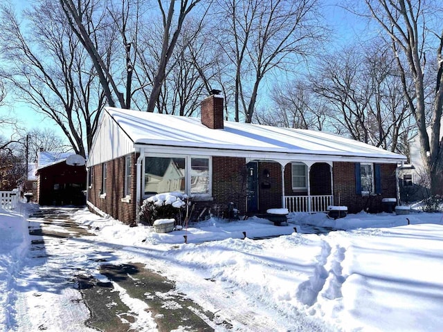 view of front of property featuring covered porch