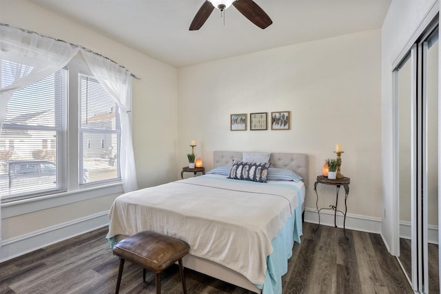 51 W 10th Ave, Oshkosh, WI 54902 - bedroom featuring a closet, dark hardwood / wood-style floors, and ceiling fan