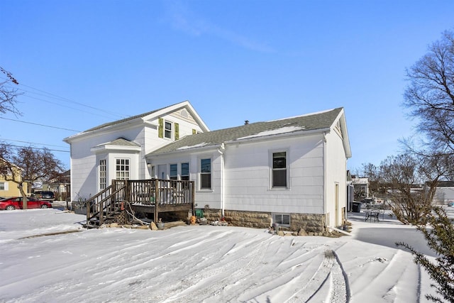 51 W 10th Ave, Oshkosh, WI 54902 - snow covered property featuring a wooden deck