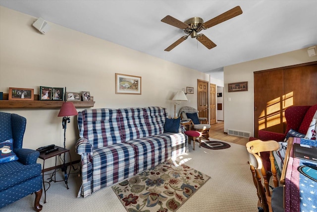 living room featuring ceiling fan