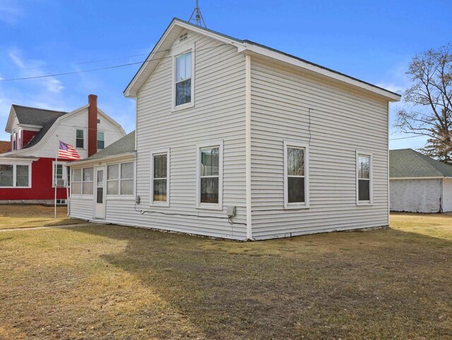 505 S Howard St, Princeton, WI 54968 - back of property with a yard and a sunroom