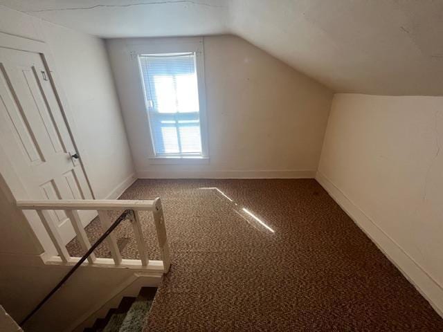 505 S Howard St, Princeton, WI 54968 - bonus room featuring stairway, carpet floors, baseboards, and vaulted ceiling