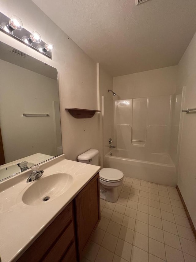 full bathroom featuring shower / tub combination, vanity, a textured ceiling, toilet, and tile patterned floors