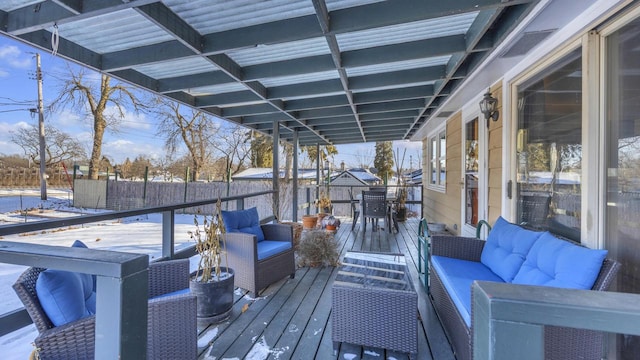 snow covered deck with outdoor lounge area