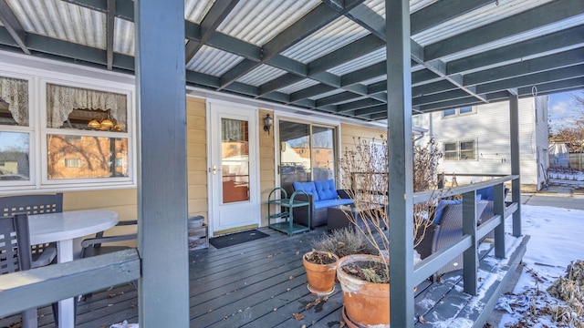 view of snow covered deck