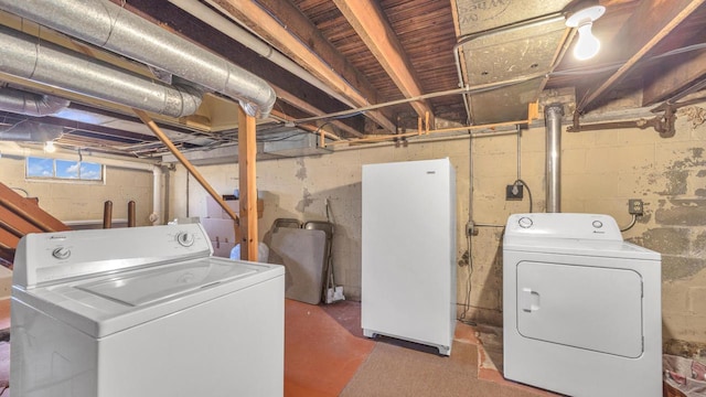 laundry room featuring washing machine and dryer