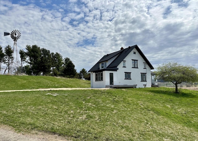 N19027 County Road F, Trempealeau, WI 54661 - view of home's exterior with a yard and a chimney