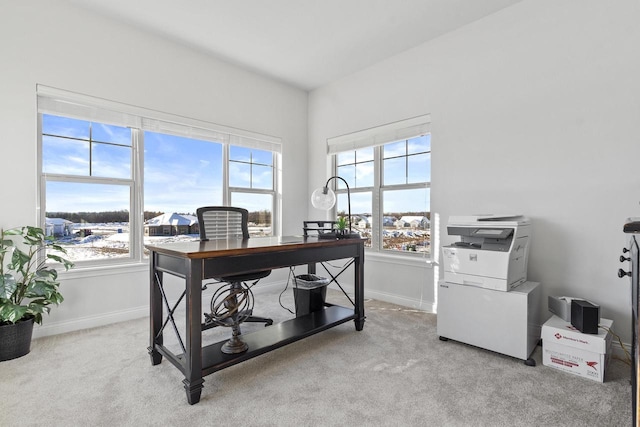 carpeted office featuring a healthy amount of sunlight