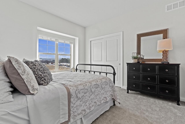 bedroom with light carpet