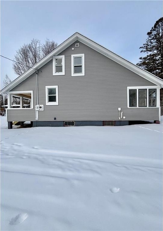 view of snow covered property