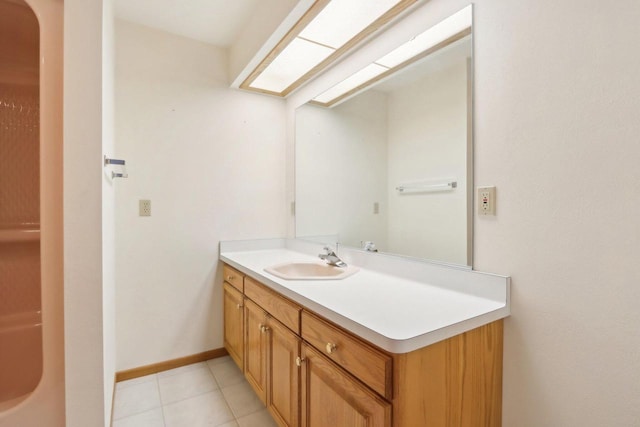 bathroom with vanity and tile patterned flooring