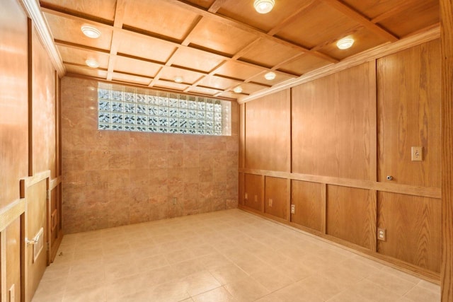 basement with wood ceiling, elevator, and wood walls