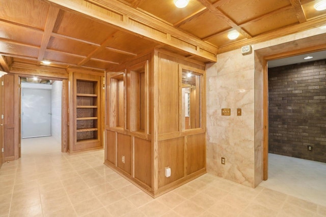 basement with built in features, wooden ceiling, and wooden walls