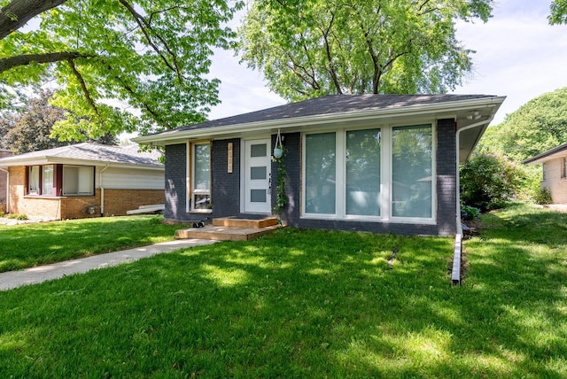 view of front of house with a front yard