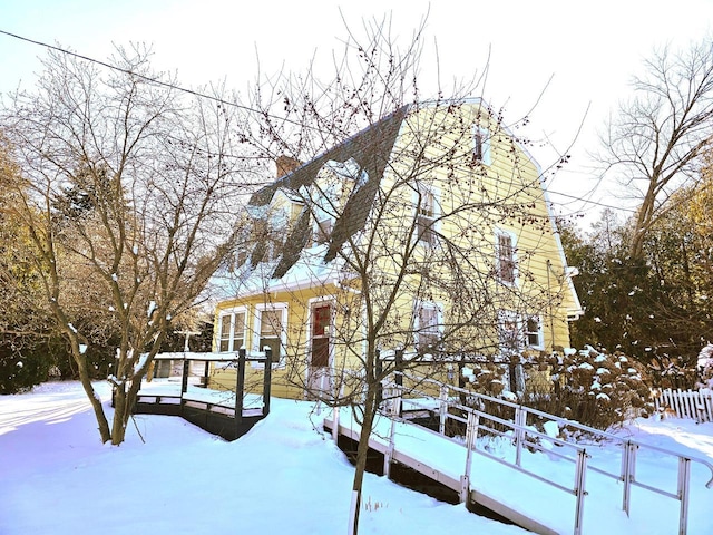 view of snow covered property