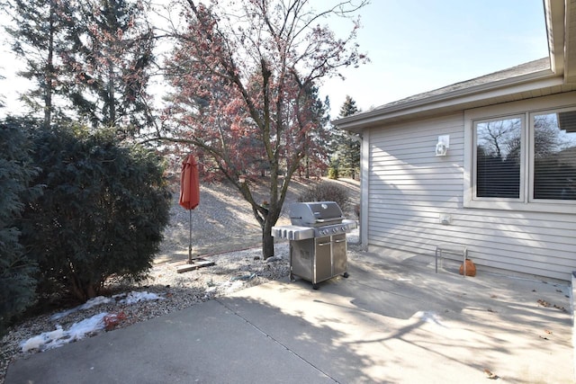 view of patio with a grill