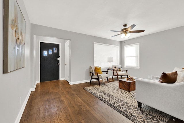 entrance foyer with ceiling fan and dark hardwood / wood-style flooring