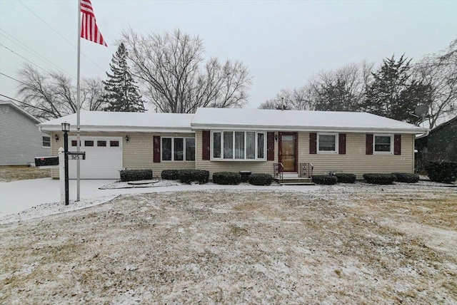 single story home with a garage