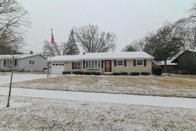 single story home with a garage