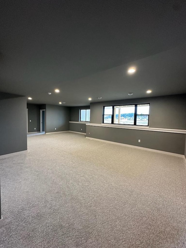 basement featuring carpet flooring