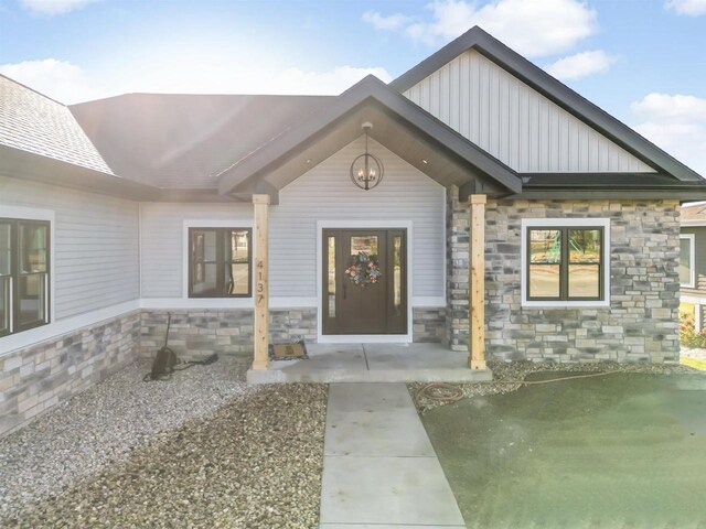822 Westbridge Trl, Waunakee, WI 53597 - view of exterior entry featuring a patio area
