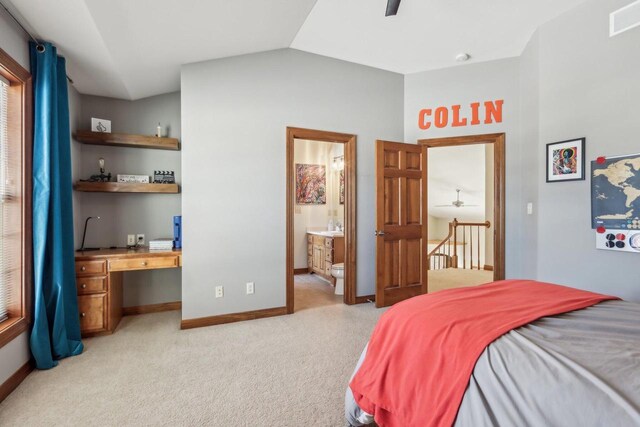 N33W29204 Millridge Rd, Pewaukee, WI 53072 - carpeted bedroom with lofted ceiling, built in desk, and ensuite bath