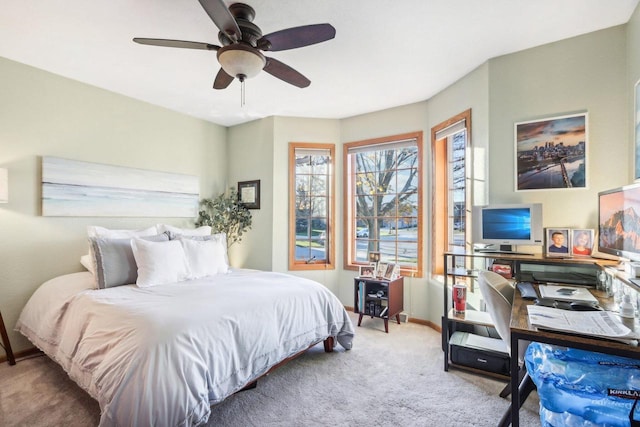 bedroom featuring ceiling fan and carpet flooring