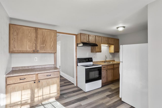 kitchen with range with electric stovetop, dark hardwood / wood-style flooring, sink, and white refrigerator