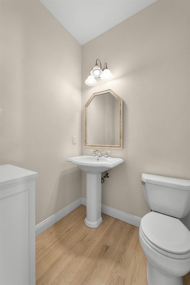 1809 Shady Point Dr, Verona, WI 53593 - bathroom with hardwood / wood-style floors, sink, and toilet
