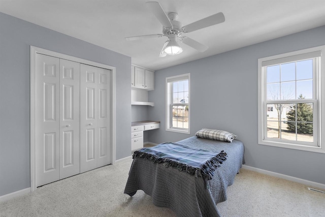 1809 Shady Point Dr, Verona, WI 53593 - carpeted bedroom with ceiling fan and a closet