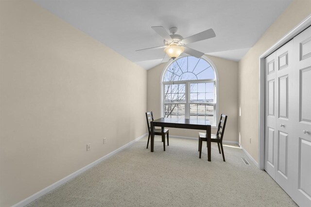 1809 Shady Point Dr, Verona, WI 53593 - dining room featuring vaulted ceiling, light colored carpet, and ceiling fan