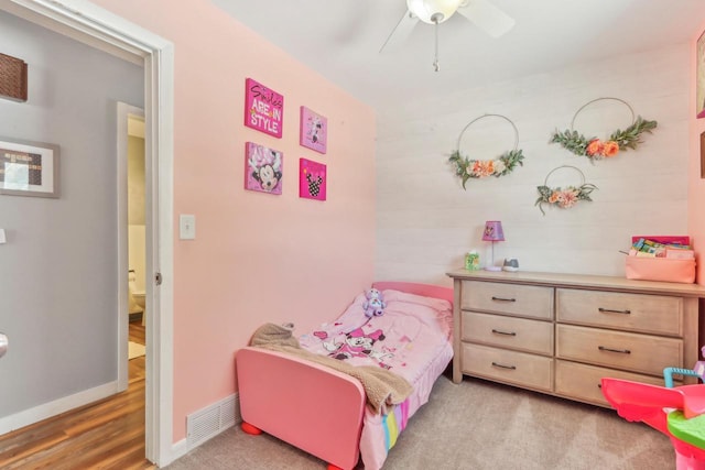 bedroom featuring ceiling fan and light wood-type flooring