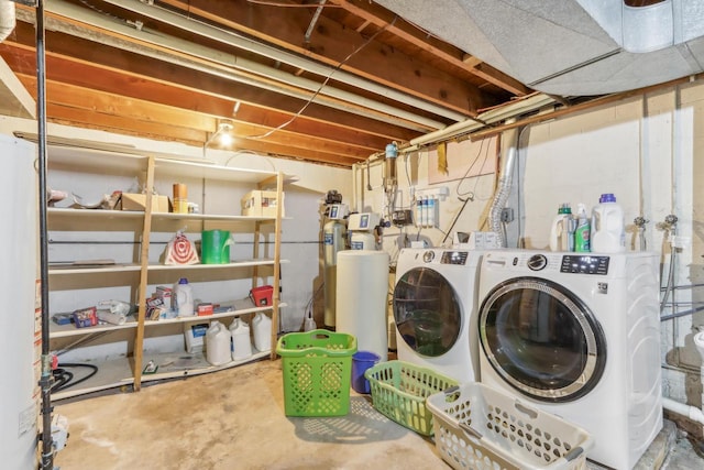 laundry area with independent washer and dryer