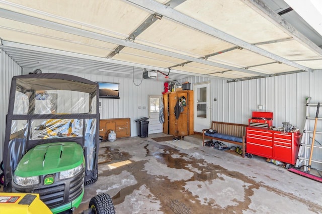 garage featuring a garage door opener