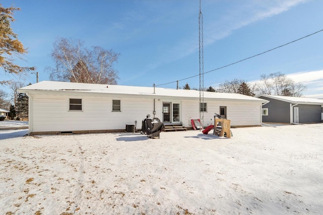 back of property featuring central AC unit