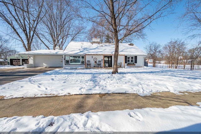 view of front of home featuring a garage