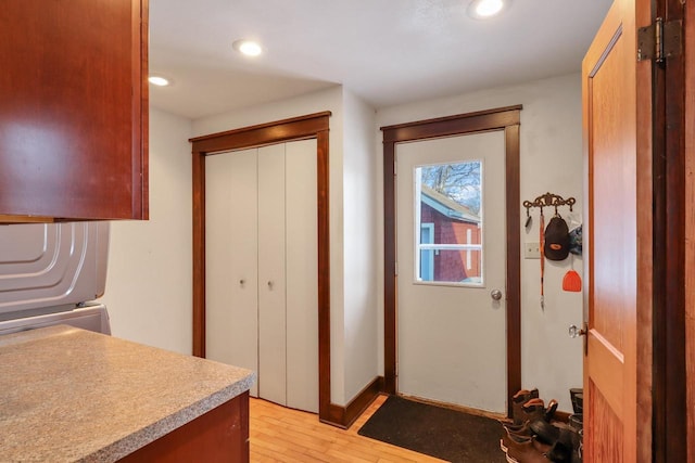 doorway with light hardwood / wood-style floors