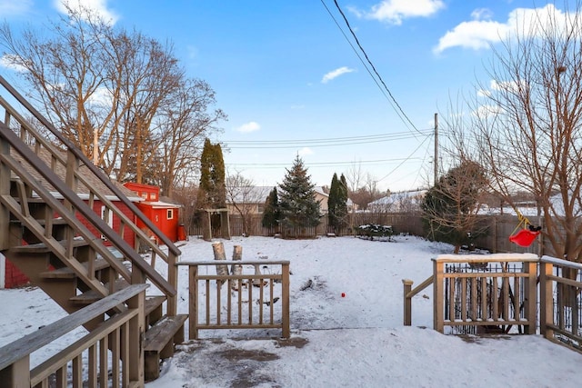 view of yard layered in snow