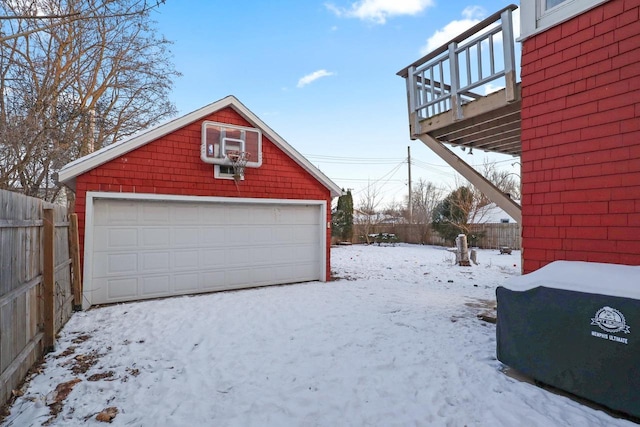 view of snow covered garage