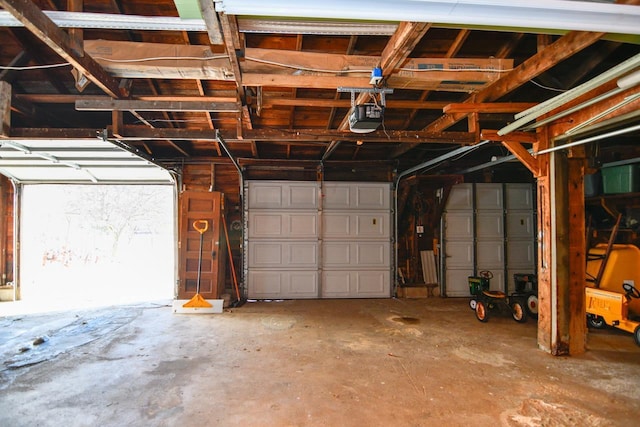 garage featuring a garage door opener