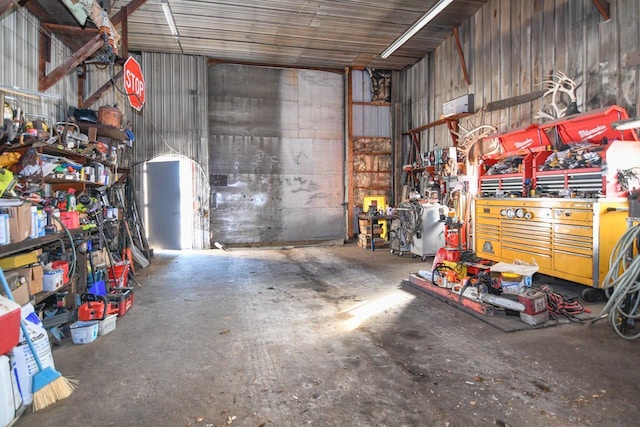 garage with a workshop area