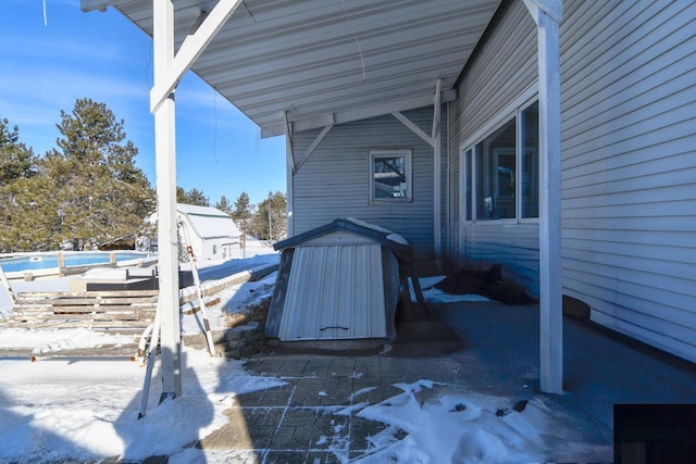 view of snow covered patio