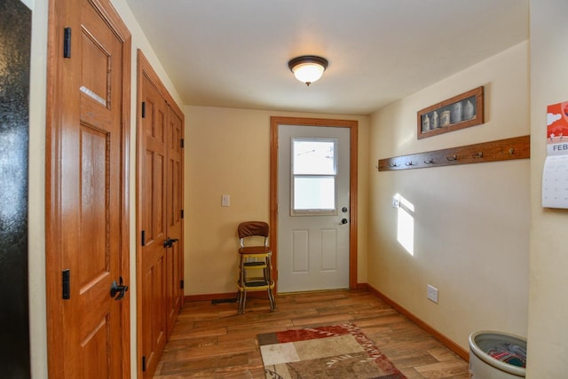 doorway featuring dark hardwood / wood-style flooring