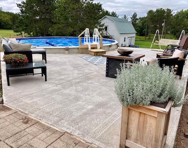 view of patio / terrace featuring an outdoor structure