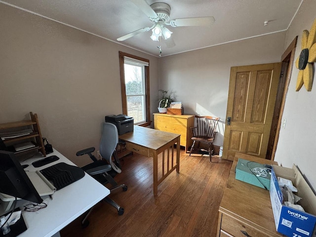 home office with hardwood / wood-style floors and ceiling fan