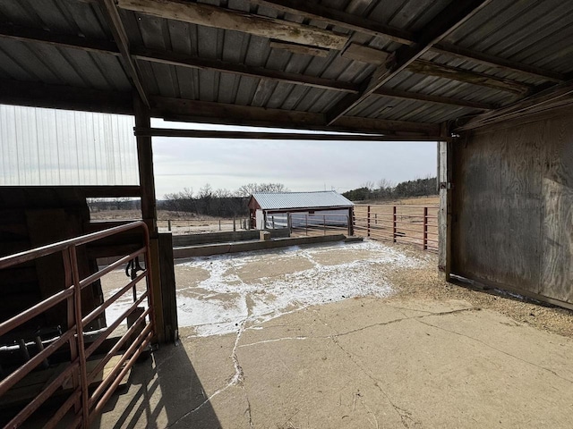 view of patio / terrace with an outbuilding