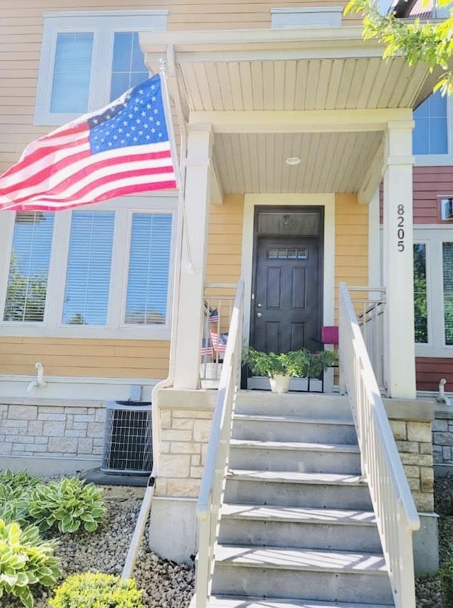 property entrance featuring cooling unit